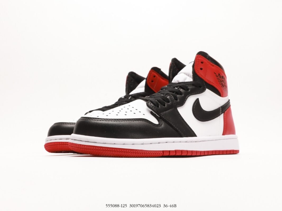 High-top sneaker with a black, white, and red color scheme.