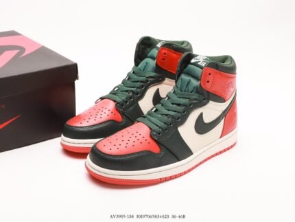A pair of red, black, and green high-top sneakers next to a black box.