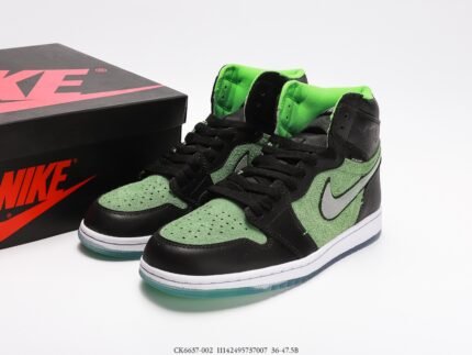 A pair of green and black high-top sneakers next to a black box.