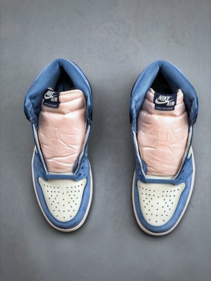 Pair of blue and white sneakers viewed from above.