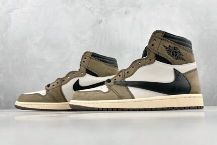 A pair of high-top sneakers in khaki and dark green with a nubuck upper.