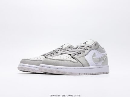 Gray sports shoes with a checkmark logo on the side.