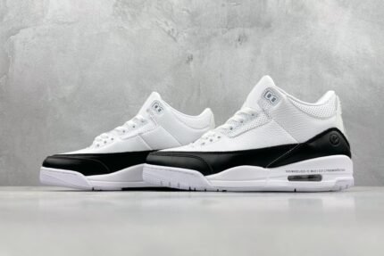 Pair of white and black sneakers with a sleek design