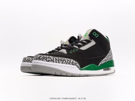 Black high-top sports shoes with green accents, white sole