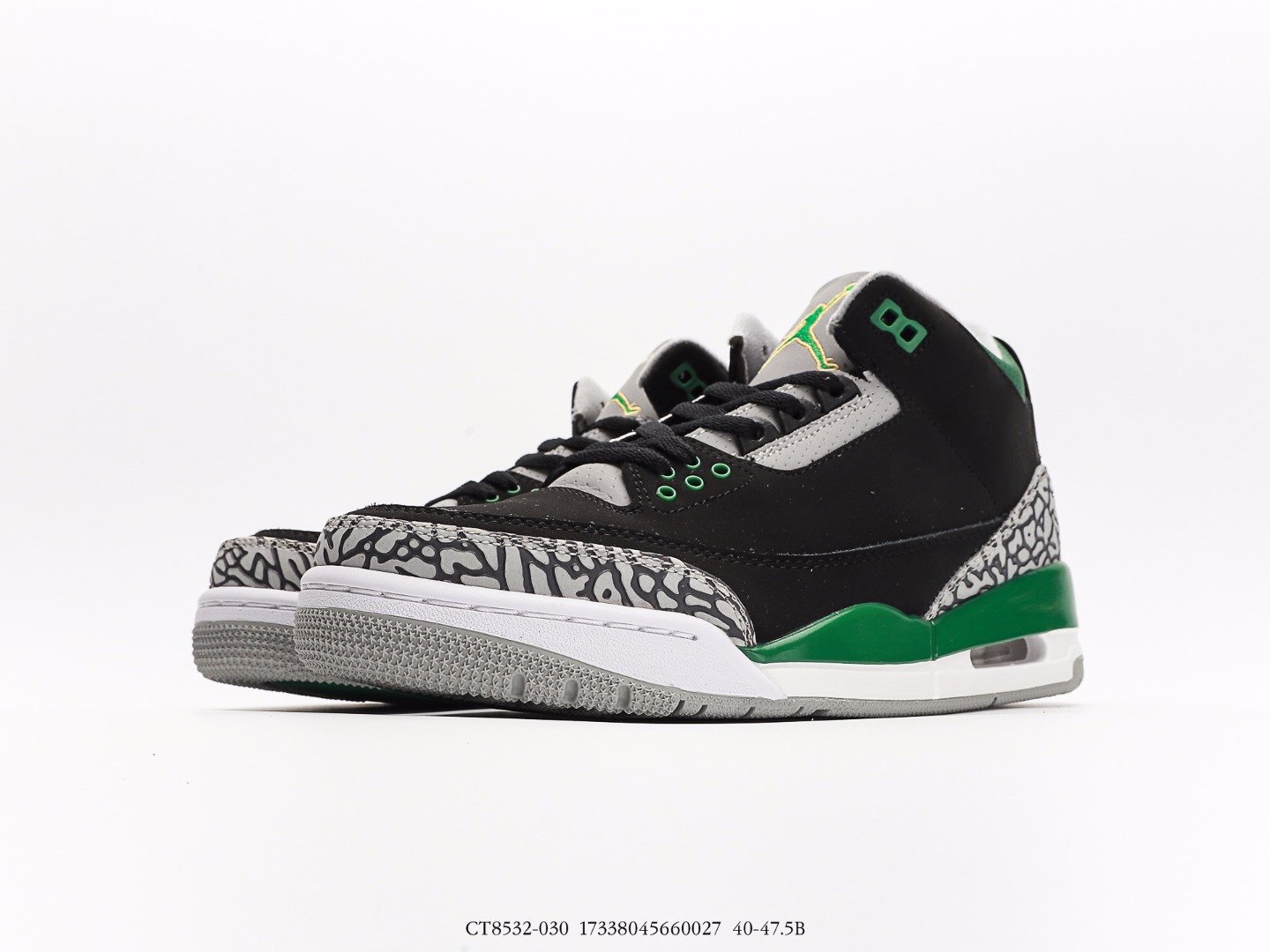 Black and Green High-Top Basketball Shoes Black high-top sports shoes with green accents, white sole