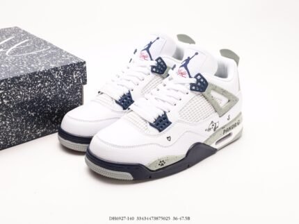 White sneakers with blue and grey accents, black shoebox