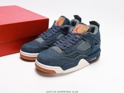 Dark blue sneakers with brown details, red shoebox beside