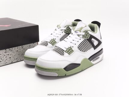 White, green, and black low-top sneakers with white laces and green detail decorations