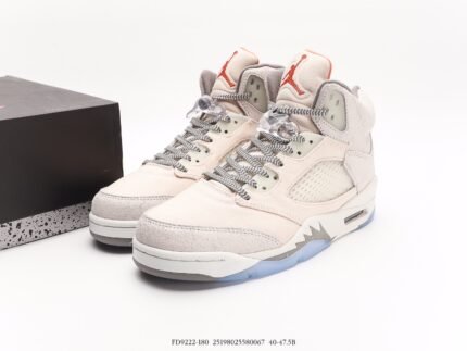 High-top sneakers in light beige with gray accents.