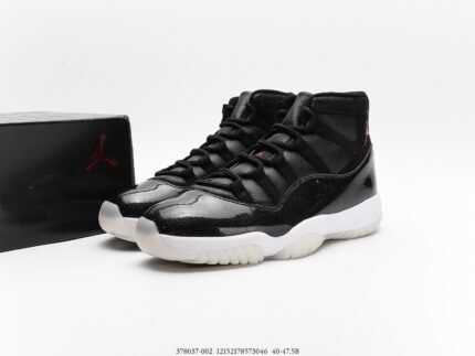 A pair of black high-top sneakers with special materials and design details.