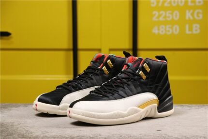 Black and gold high-top sports shoes with white soles, yellow background