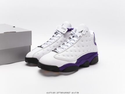 White sports shoes with purple and black details, white laces
