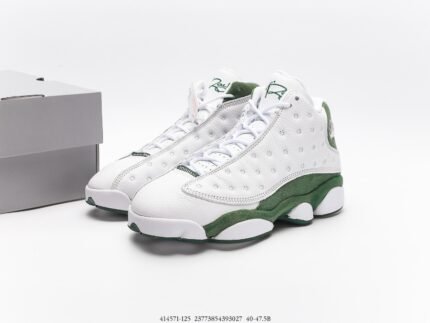 White and green high-top sports shoes with lace-up closure, gray shoe box