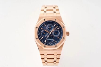 Rose gold watch with a blue dial and matching bracelet.