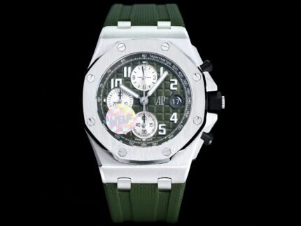 A watch with multiple dials and a green strap.