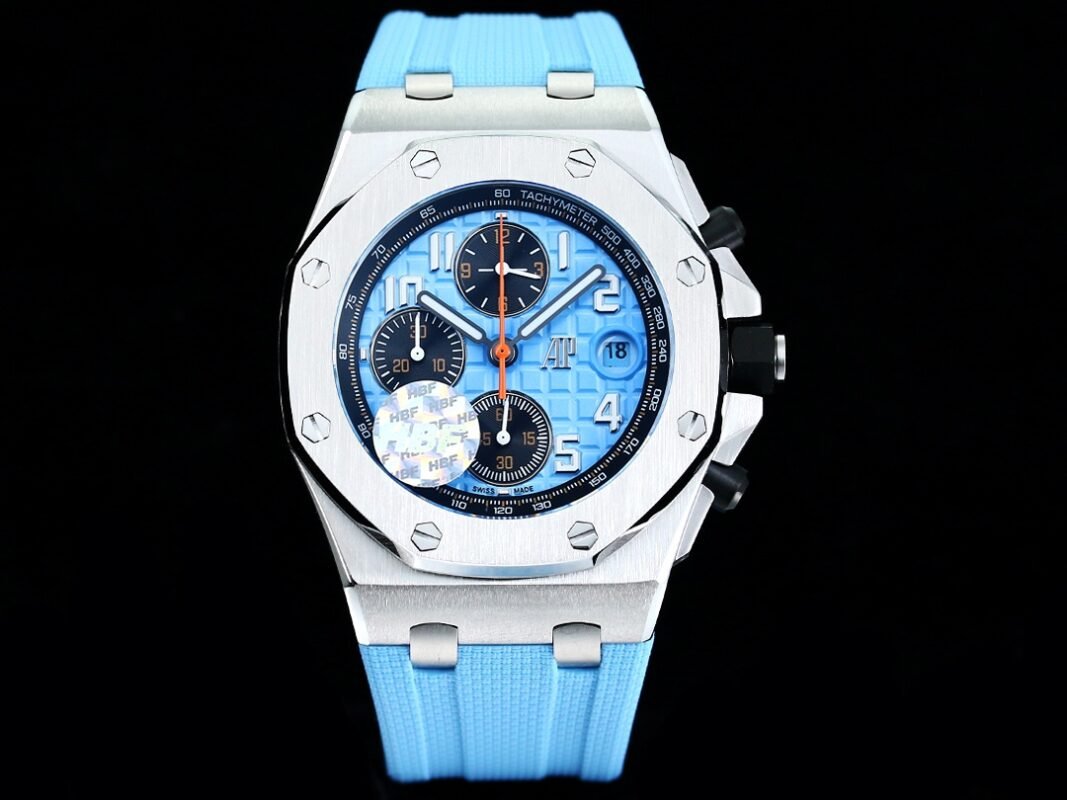 A watch with multiple dials and a blue strap.