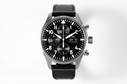 A wristwatch with a black dial and a black leather strap.