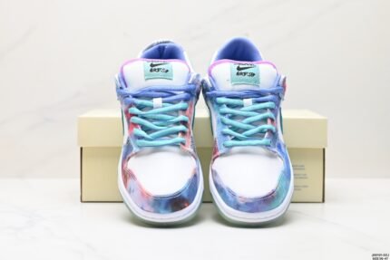 A pair of Nike Dunk Low sneakers with a tie-dye pattern and a translucent green outsole.