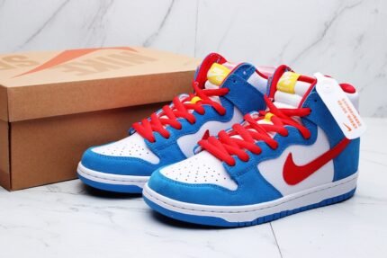 A pair of blue, white, and red Nike Dunk High sneakers on a white marble background.