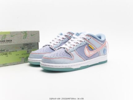 A pair of blue Nike Dunk Low sneakers with a grid pattern and orange accents, placed next to a luggage tag.