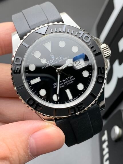 A silver wristwatch with a black dial and silver bracelet.