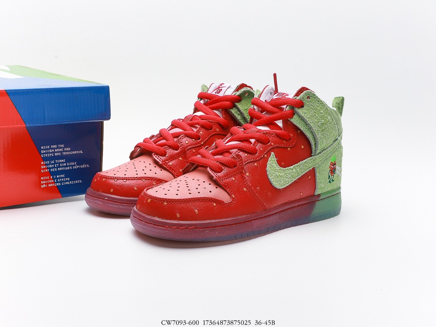 Red and green Nike Dunk Low sneakers with a red and blue shoebox.