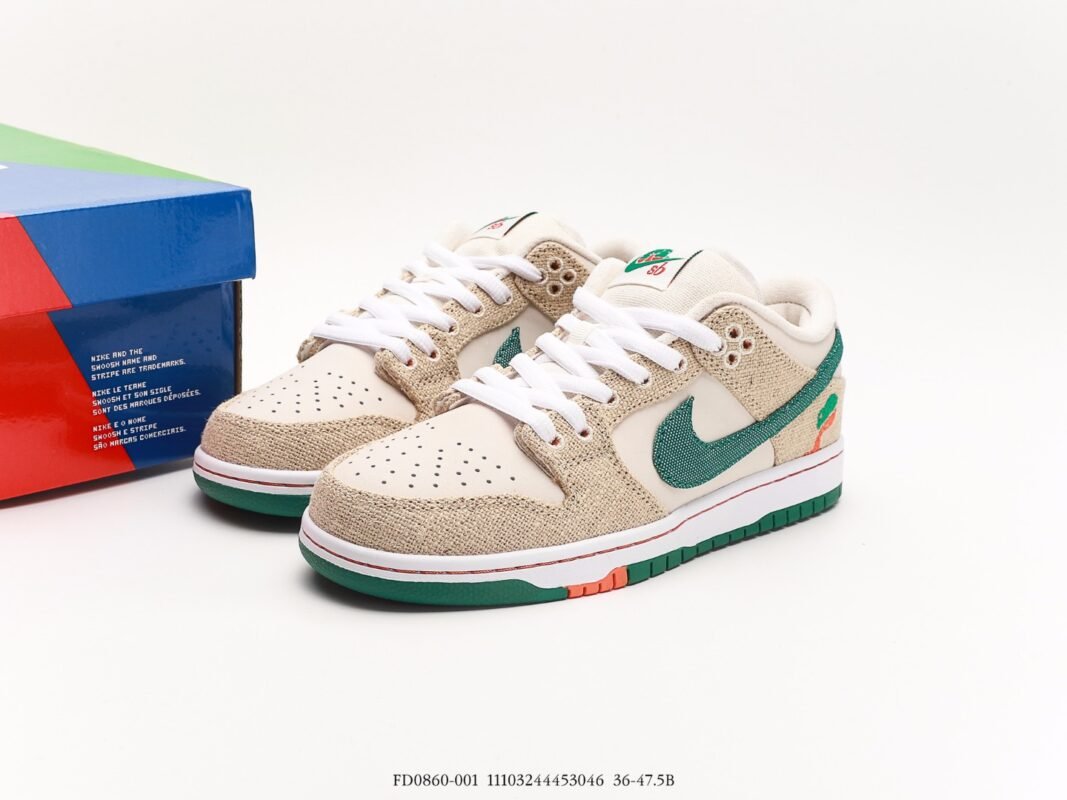 Beige and green Nike Dunk Low sneakers with a colorful shoebox.