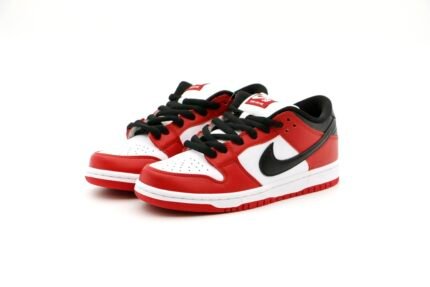 A pair of red and white sneakers with black decorative lines on the upper.