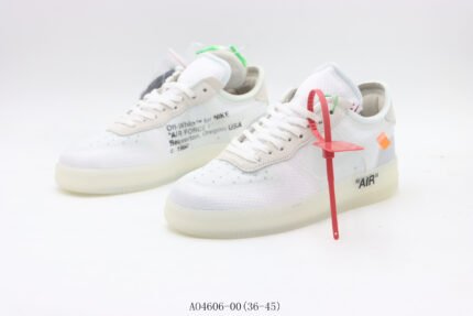 A pair of white sports shoes with red laces and a transparent sole