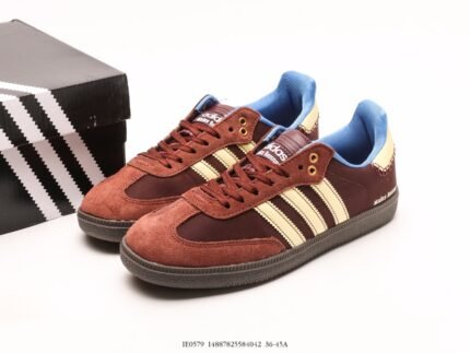 Brown sneakers with white stripes and blue lining