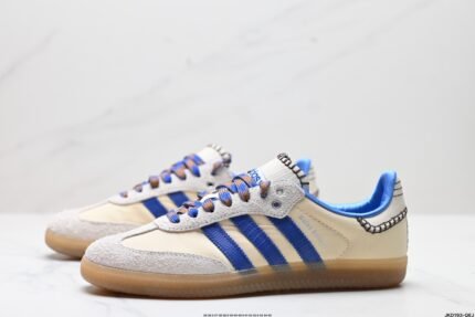 Beige and blue sneakers with brown soles