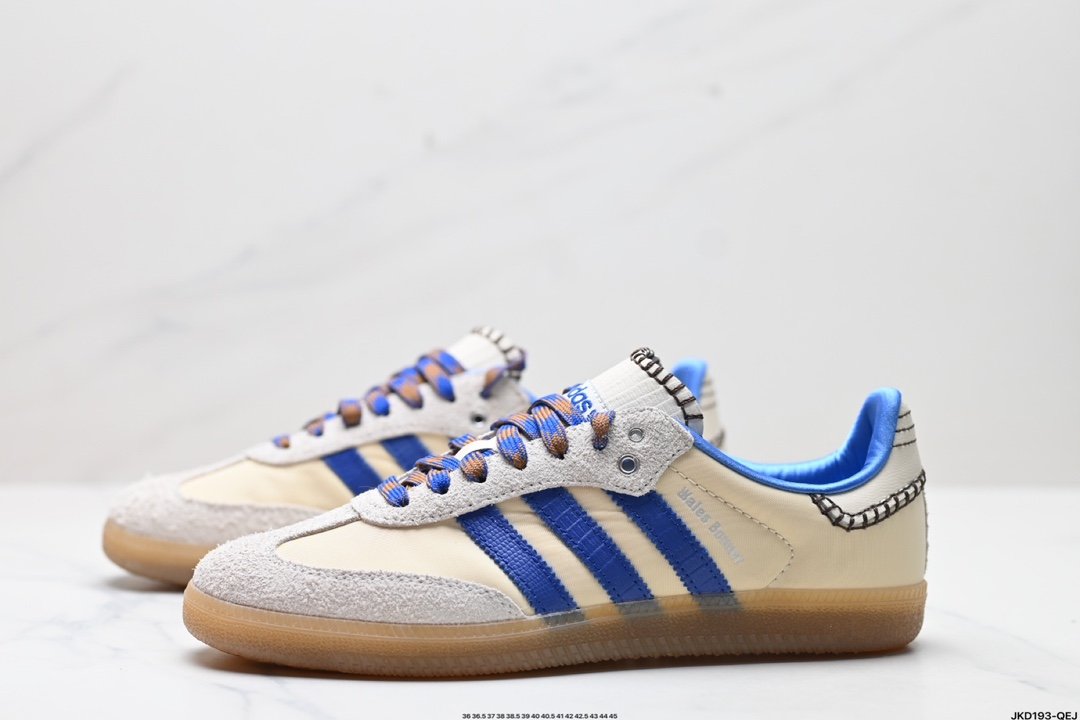 Beige and blue sneakers with brown soles