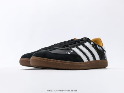 Black sneakers with white stripes and brown soles