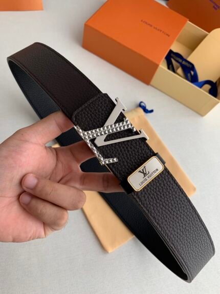 Black Louis Vuitton belt with silver buckle
