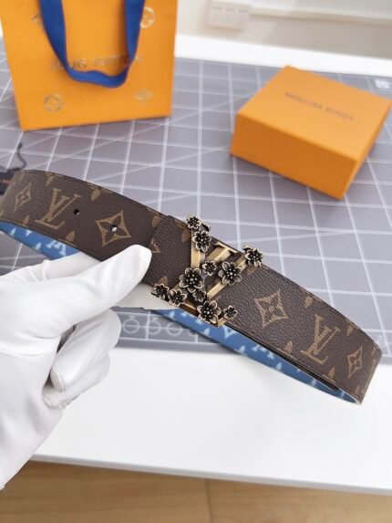 Louis Vuitton dark brown patterned belt with gold floral buckle