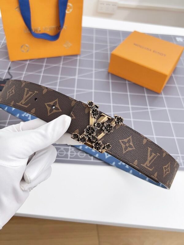 Louis Vuitton dark brown patterned belt with gold floral buckle