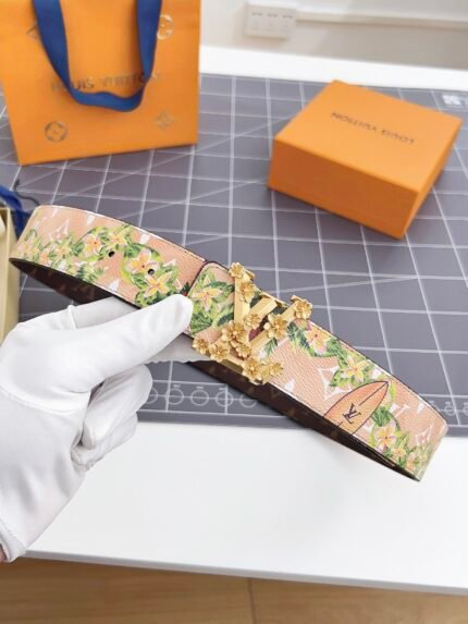Louis Vuitton floral pattern belt with gold floral buckle