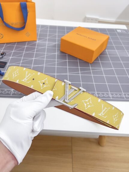 Louis Vuitton yellow belt with LV logo and braided buckle