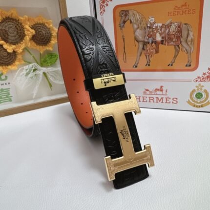 Black and orange reversible belt with gold buckle