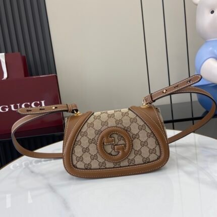 GG pattern canvas and brown leather handbag with brown double G logo