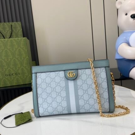 Blue and white GG pattern handbag with gold chain strap