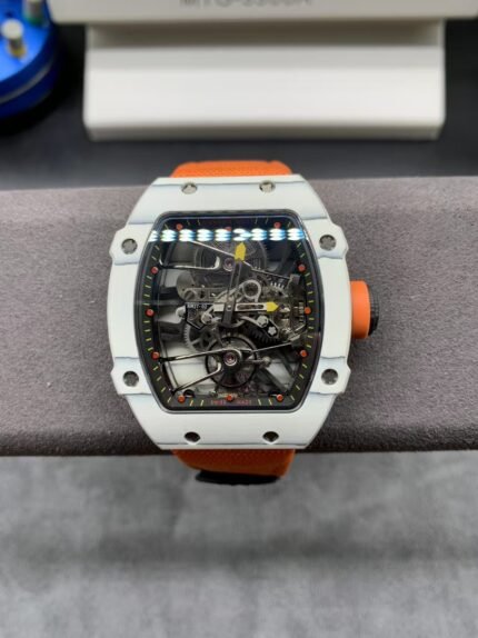 An orange and silver wristwatch with a black dial on a black strap.